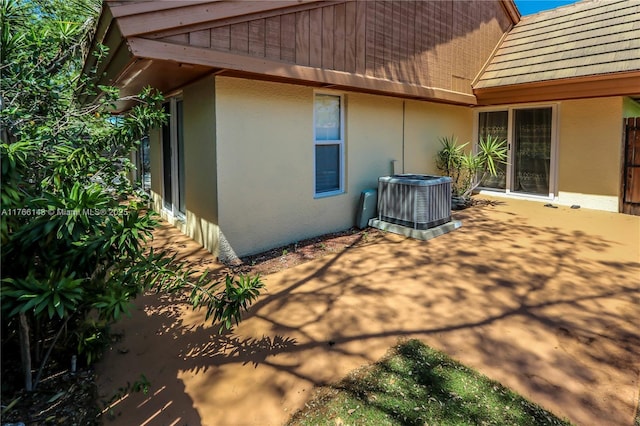 19915 NE 10th Place Way, Miami, FL 33179 - view of patio / terrace featuring central air condition unit