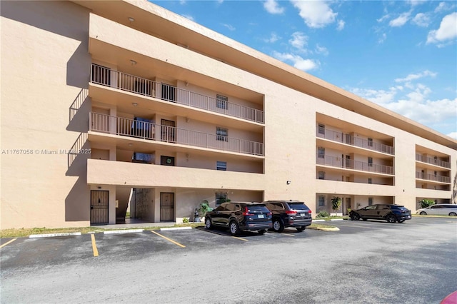8895 Fontainebleau Blvd Unit 504, Miami, FL 33172 - view of building exterior featuring uncovered parking