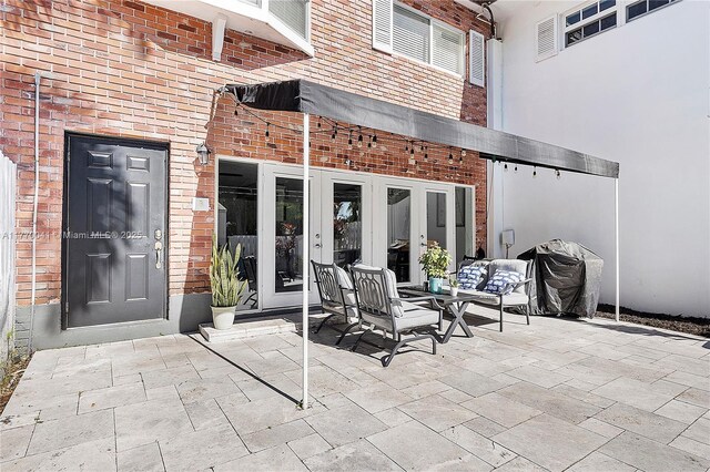 8 Hathaway Ln, Wilton Manors, FL 33305 - view of patio / terrace with french doors