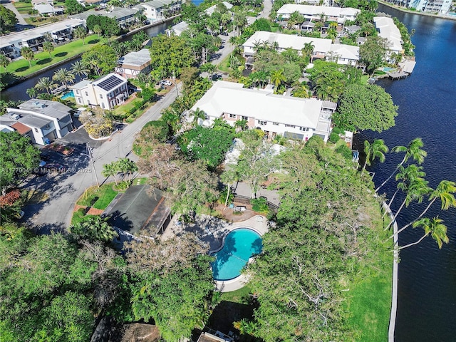 bird's eye view featuring a water view and a residential view