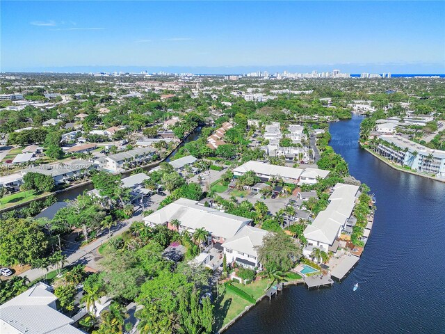 8 Hathaway Ln, Wilton Manors, FL 33305 - aerial view of property and surrounding area featuring a nearby body of water and nearby suburban area