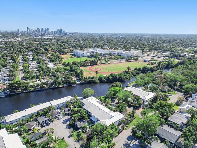 8 Hathaway Ln, Wilton Manors, FL 33305 - aerial view of residential area featuring a large body of water and city skyline