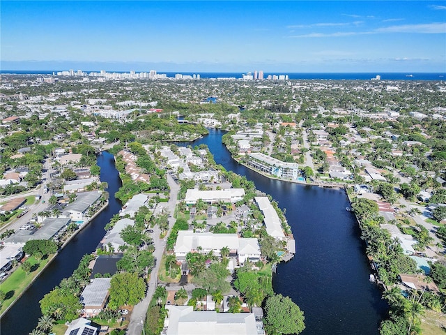 drone / aerial view featuring a water view and a residential view