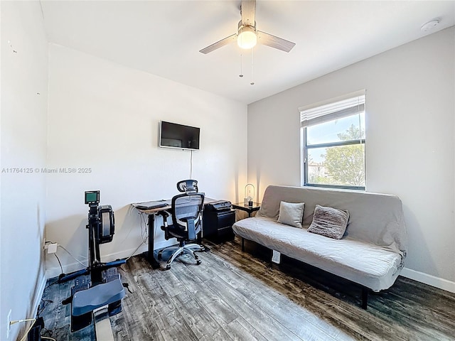 office with baseboards, ceiling fan, and wood finished floors
