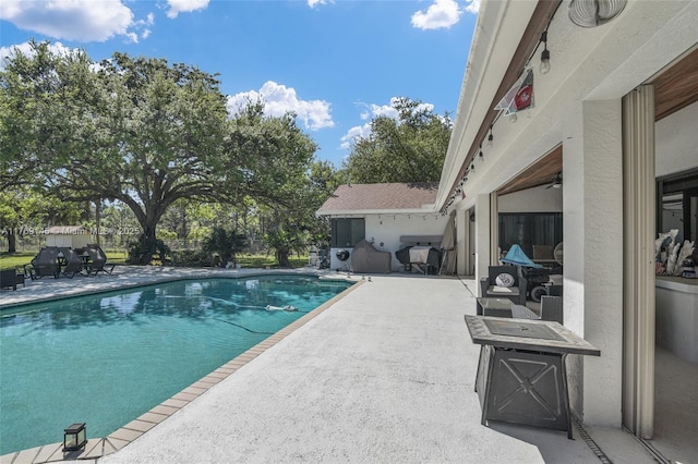 pool with a patio