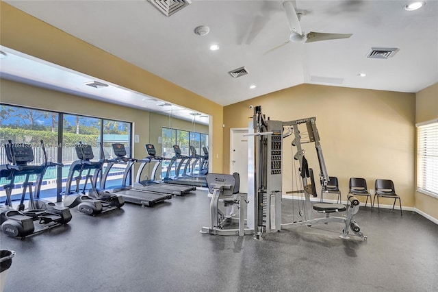gym featuring ceiling fan, visible vents, and vaulted ceiling