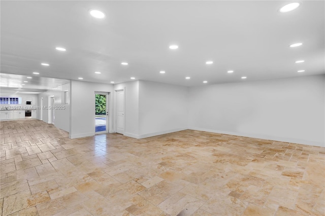 6300 SW Mitchell Dr, Coral Gables, FL 33158 - basement featuring baseboards, recessed lighting, and stone tile floors