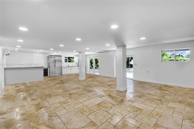 6300 SW Mitchell Dr, Coral Gables, FL 33158 - basement with recessed lighting, high quality fridge, baseboards, and stone tile flooring