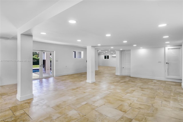 6300 SW Mitchell Dr, Coral Gables, FL 33158 - basement featuring french doors, stone finish flooring, baseboards, and recessed lighting
