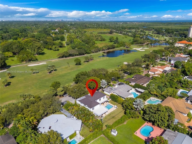6300 SW Mitchell Dr, Coral Gables, FL 33158 - drone / aerial view featuring view of golf course, a water view, and a wooded view