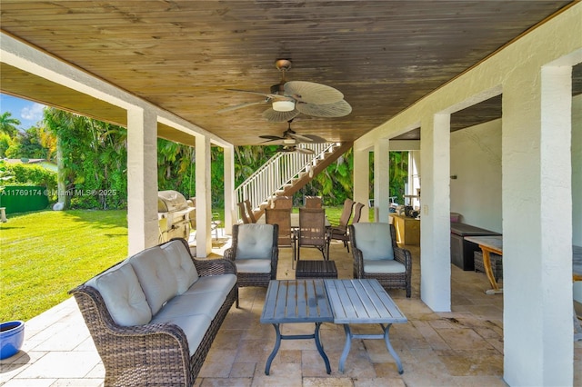 6300 SW Mitchell Dr, Coral Gables, FL 33158 - view of patio with a ceiling fan, outdoor lounge area, outdoor dining area, and stairs