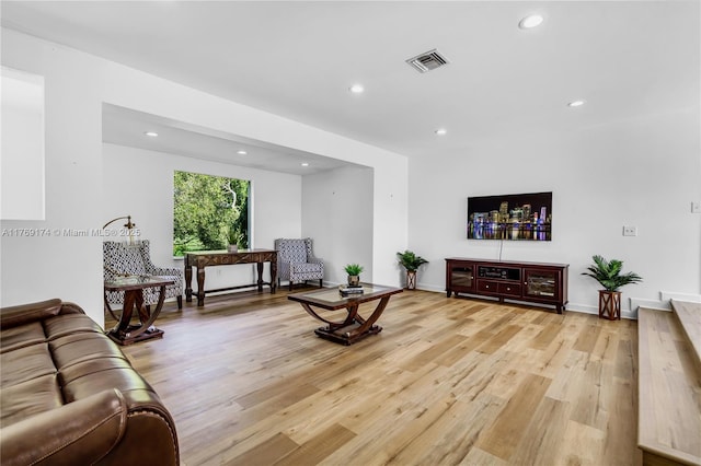 6300 SW Mitchell Dr, Coral Gables, FL 33158 - living room featuring recessed lighting, baseboards, visible vents, and light wood-type flooring