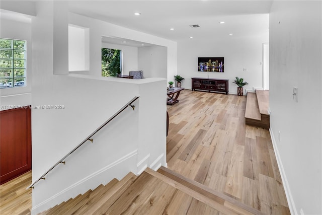 6300 SW Mitchell Dr, Coral Gables, FL 33158 - corridor with baseboards, an upstairs landing, recessed lighting, and light wood finished floors