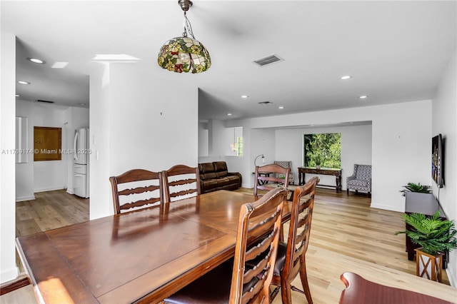 6300 SW Mitchell Dr, Coral Gables, FL 33158 - dining space with recessed lighting, light wood-style floors, and visible vents