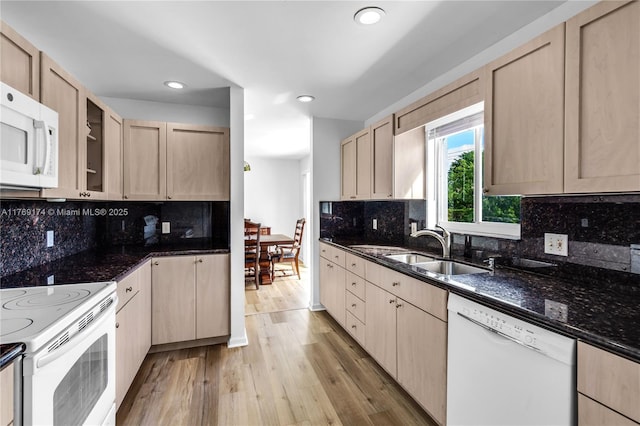 6300 SW Mitchell Dr, Coral Gables, FL 33158 - kitchen with a sink, light brown cabinetry, and white appliances