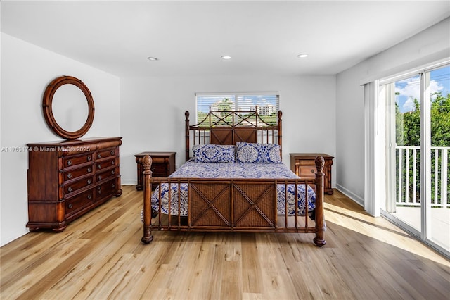 6300 SW Mitchell Dr, Coral Gables, FL 33158 - bedroom featuring access to exterior, recessed lighting, and light wood-type flooring