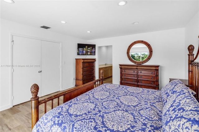 6300 SW Mitchell Dr, Coral Gables, FL 33158 - bedroom featuring visible vents, a closet, wood finished floors, and recessed lighting