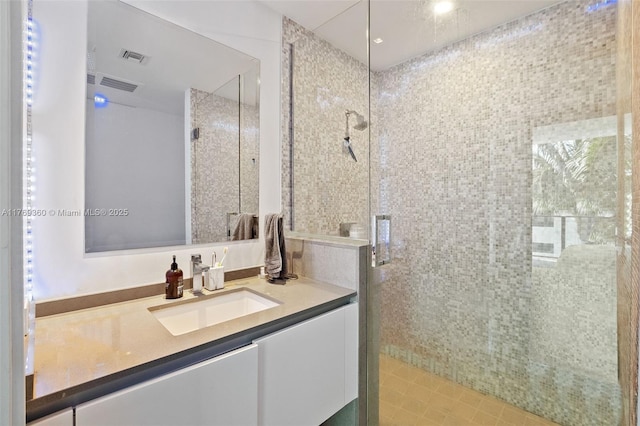 68 SE 6th St Unit 805, Miami, FL 33131 - full bathroom with visible vents, a stall shower, and vanity