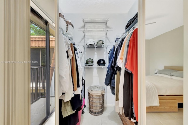 walk in closet featuring tile patterned floors