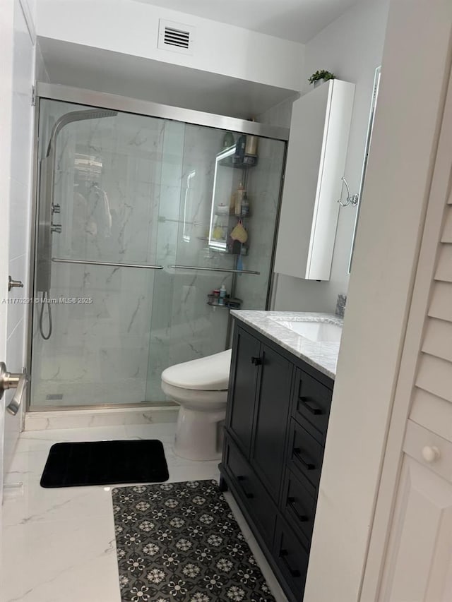 12650 Vista Isles Dr Unit 923, Sunrise, FL 33325 - bathroom with visible vents, marble finish floor, a marble finish shower, toilet, and vanity