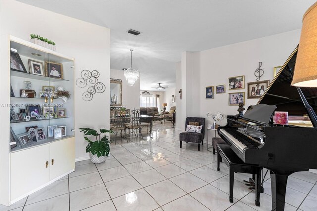 14930 SW 178th Ter, Miami, FL 33187 - living area featuring visible vents, a ceiling fan, and light tile patterned floors