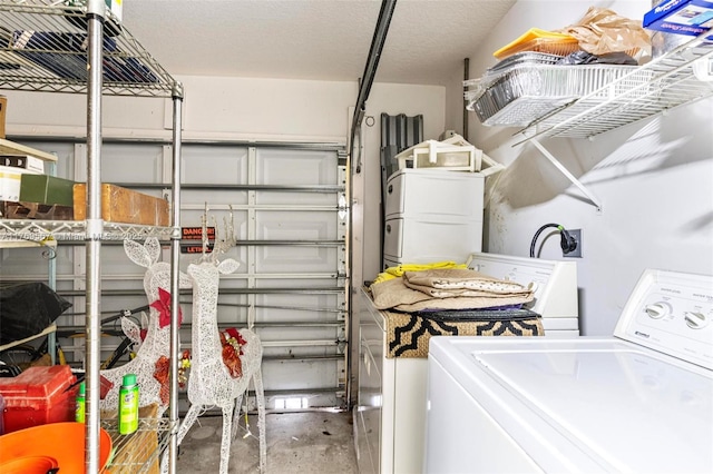 14930 SW 178th Ter, Miami, FL 33187 - washroom with washing machine and dryer, laundry area, and a textured ceiling