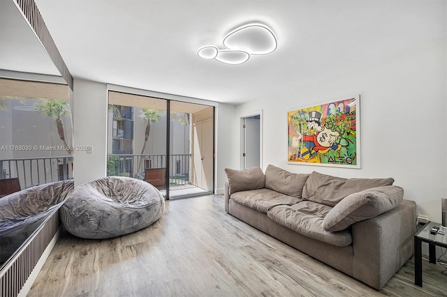 14601 N Kendall Dr Unit 206K, Miami, FL 33186 - living room featuring expansive windows and wood finished floors