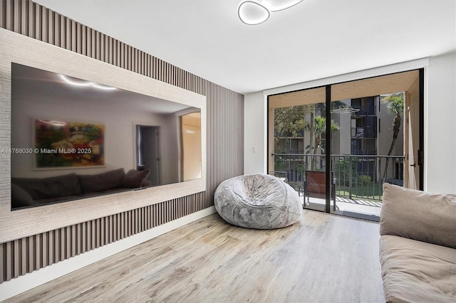 14601 N Kendall Dr Unit 206K, Miami, FL 33186 - living area featuring wood finished floors and baseboards