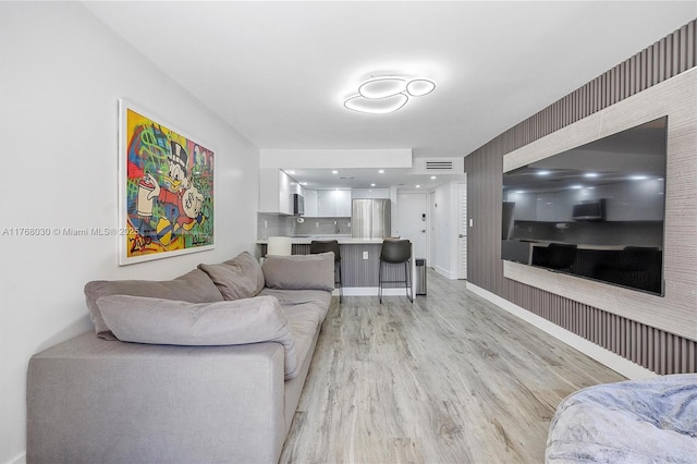 14601 N Kendall Dr Unit 206K, Miami, FL 33186 - living room with baseboards, visible vents, and light wood-style floors
