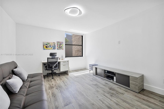 14601 N Kendall Dr Unit 206K, Miami, FL 33186 - home office featuring baseboards and wood finished floors