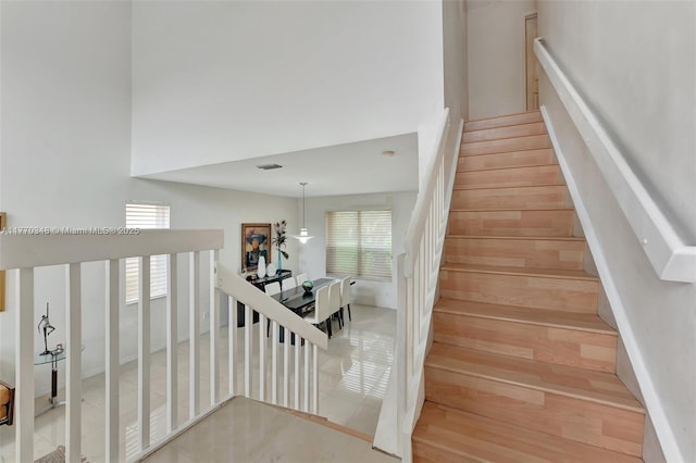 16103 Opal Creek Dr, Weston, FL 33331 - stairway with wood finished floors and a towering ceiling
