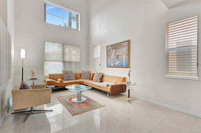 16103 Opal Creek Dr, Weston, FL 33331 - living room with a towering ceiling and baseboards