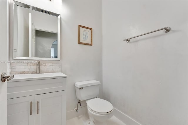 16103 Opal Creek Dr, Weston, FL 33331 - half bathroom with toilet, tasteful backsplash, vanity, and baseboards
