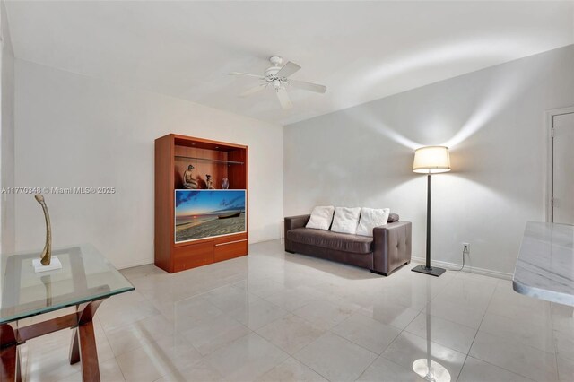 16103 Opal Creek Dr, Weston, FL 33331 - sitting room with ceiling fan, baseboards, and tile patterned flooring