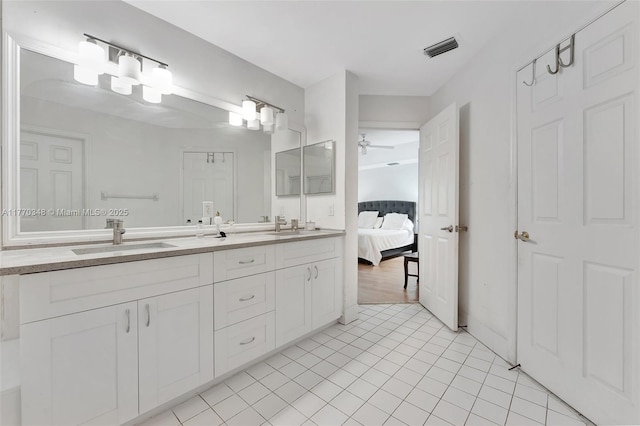 16103 Opal Creek Dr, Weston, FL 33331 - ensuite bathroom featuring double vanity, ceiling fan, and tile patterned floors