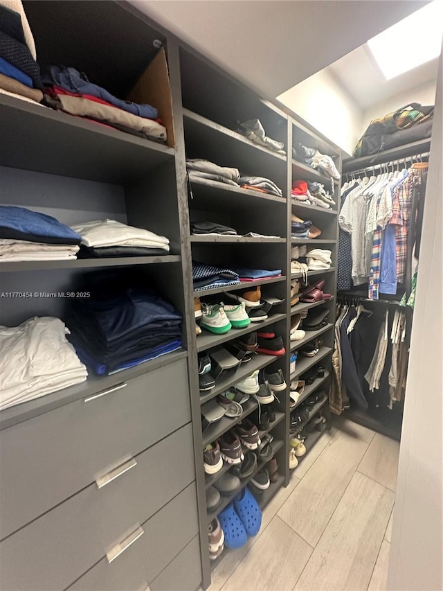 20225 NE 34th St Unit 1022, Aventura, FL 33180 - walk in closet featuring wood finish floors