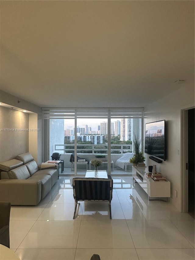 20225 NE 34th St Unit 1022, Aventura, FL 33180 - living area featuring a wall of windows and light tile patterned floors
