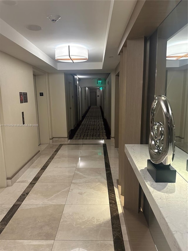 20225 NE 34th St Unit 1022, Aventura, FL 33180 - hallway with marble finish floor and baseboards
