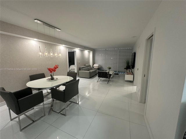 20225 NE 34th St Unit 1022, Aventura, FL 33180 - dining space featuring tile patterned floors and baseboards