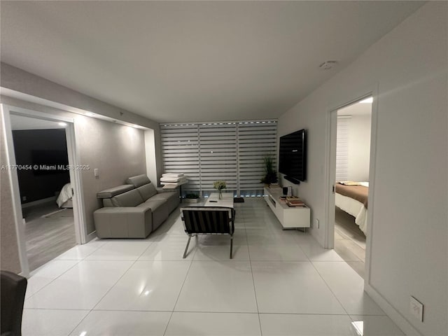 20225 NE 34th St Unit 1022, Aventura, FL 33180 - living area with baseboards and light tile patterned floors