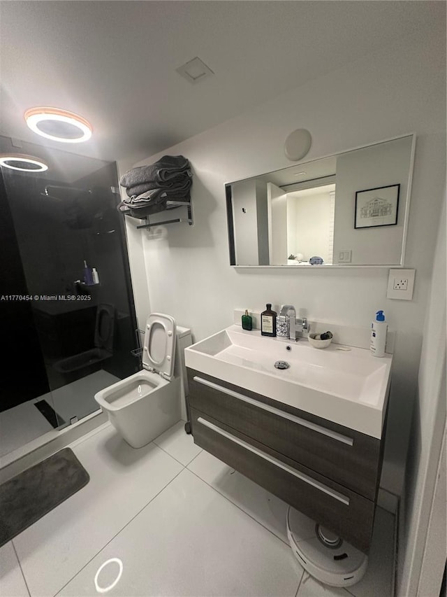 20225 NE 34th St Unit 1022, Aventura, FL 33180 - bathroom featuring vanity, toilet, tile patterned floors, and a shower stall