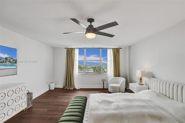 10000 W Bay Harbor Dr Unit Ph23, Bay Harbor Islands, FL 33154 - bedroom featuring wood finished floors and a ceiling fan