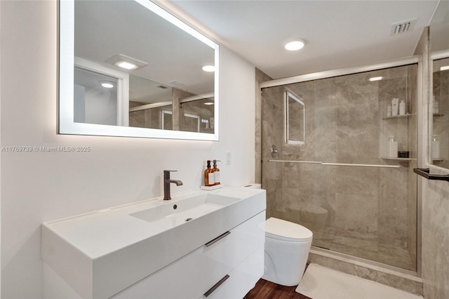 10000 W Bay Harbor Dr Unit Ph23, Bay Harbor Islands, FL 33154 - bathroom featuring vanity, a stall shower, and wood finished floors