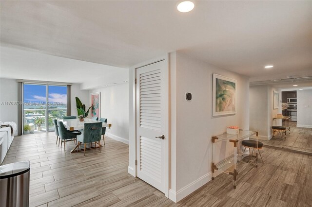 10000 W Bay Harbor Dr Unit Ph23, Bay Harbor Islands, FL 33154 - corridor with light wood-type flooring and recessed lighting