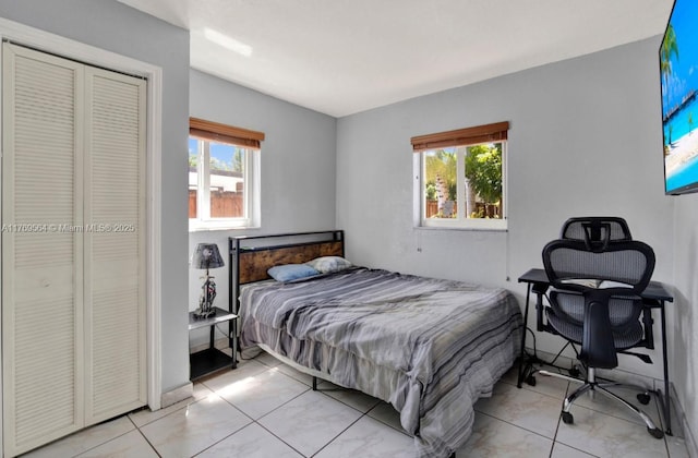 30328 SW 158th Pl, Homestead, FL 33033 - bedroom with wood finished floors, baseboards, and visible vents
