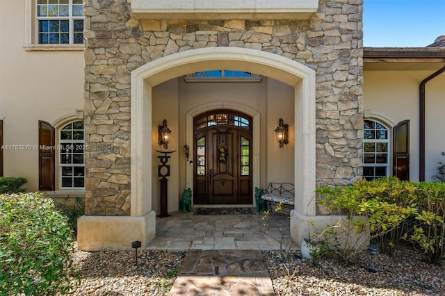 12483 Grand Oaks Dr, Davie, FL 33330 - property entrance with stone siding and stucco siding