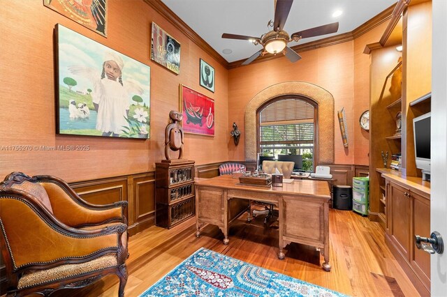 12483 Grand Oaks Dr, Davie, FL 33330 - office with ornamental molding, ceiling fan, light wood-style flooring, and a wainscoted wall