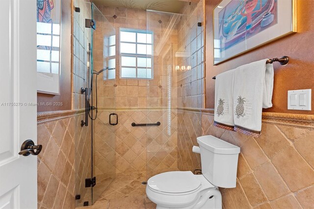 12483 Grand Oaks Dr, Davie, FL 33330 - full bathroom with toilet, tile walls, and a shower stall