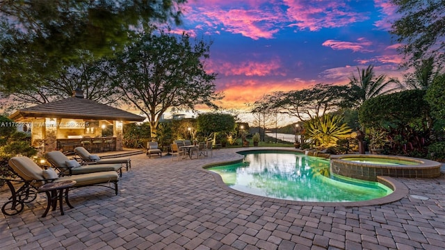 12483 Grand Oaks Dr, Davie, FL 33330 - view of swimming pool with a patio, a pool with connected hot tub, and a gazebo