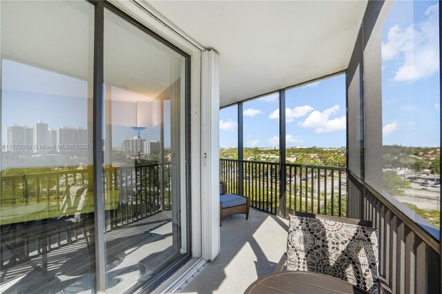 sunroom with a city view